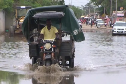 severe flooding in Angola with submerged streets and damaged homes after heavy rain
