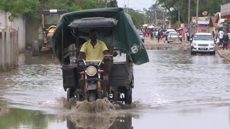 severe flooding in Angola with submerged streets and damaged homes after heavy rain