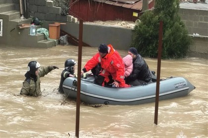 severe flooding in Dagestan Russia with submerged streets and rescue operations