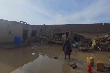 Afghanistan flood destruction with collapsed homes and muddy water after heavy rainfall disaster