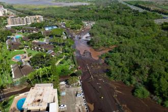 severe flooding in Hawaii after Kona storms with damaged homes and roads